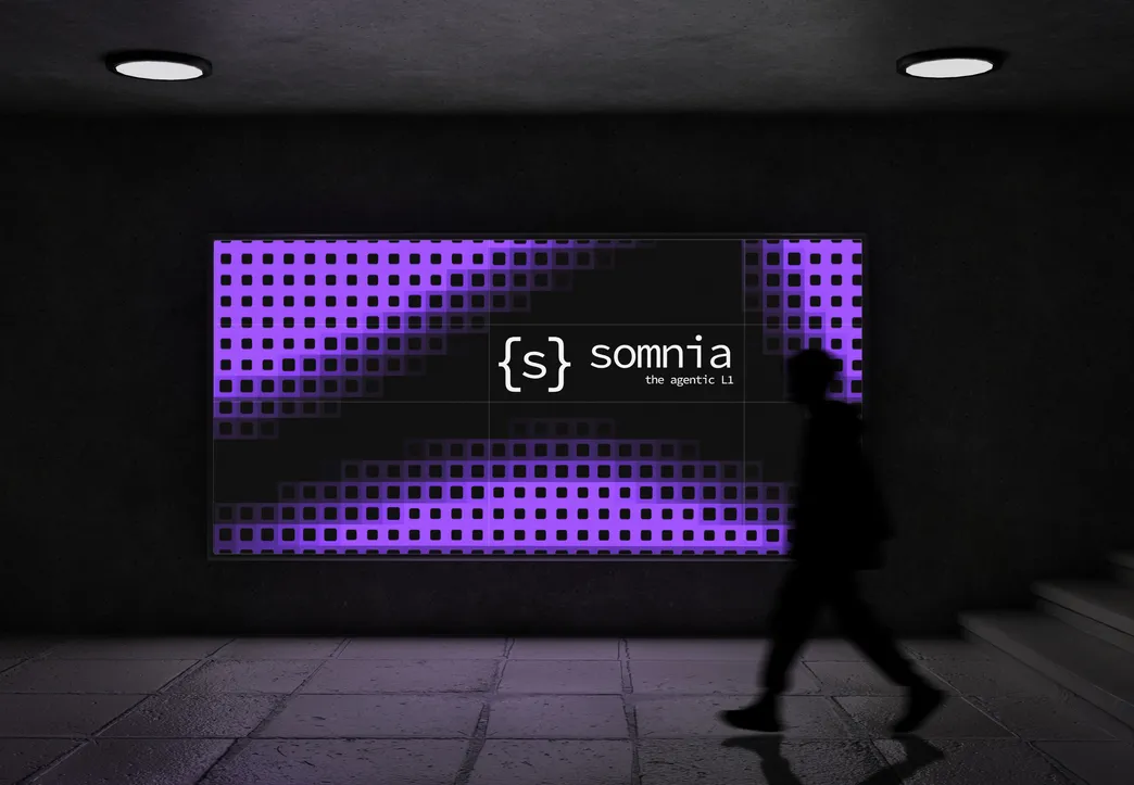 Somnia billboard in an underpass, someone walking past it